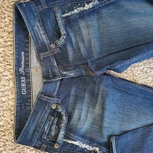Guess dark blue jeans with gold rhinestones